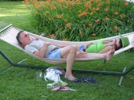 Bob and Kim Barrett relaxing on a hammock.