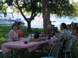 Dan and Don along with their spouses talking with Marie Racine.